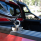 This strong magnet puts a loop mount anywhere you want on your truck. But you could also install hooks like this permanently if you wanted to expedite mounting even more